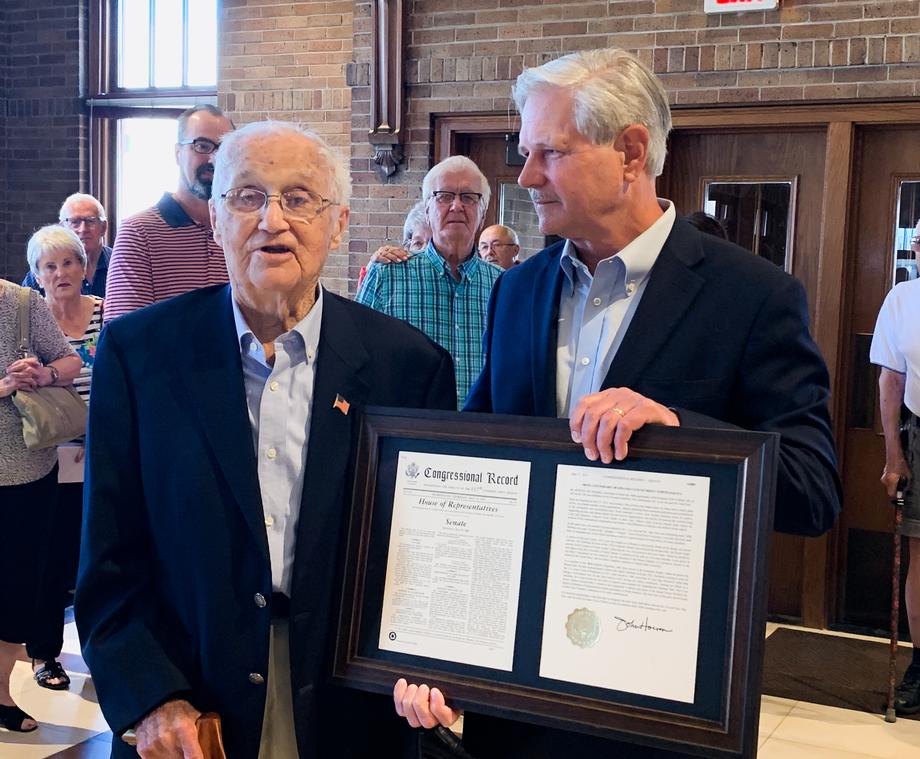 June 2021 - Senator Hoeven presents Lynn Aas with a copy of the May 27th Congressional Record which includes the senator’s statement recognizing his 100th birthday.