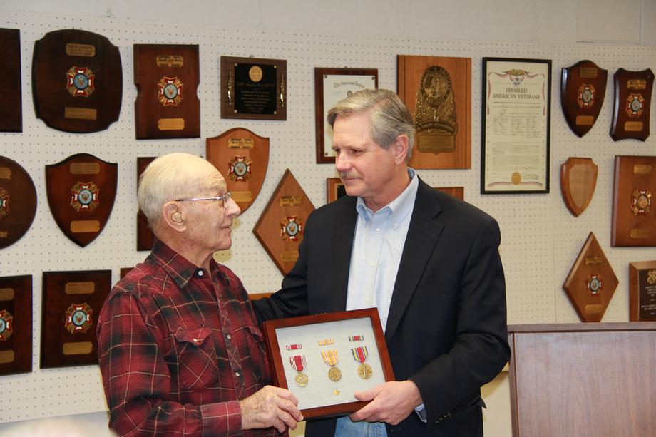 Dickinson Medal Ceremony-December 2013- Senator Hoeven presents World War II Veteran Anton V. Tuhy with the military awards he earned while serving in the United States Army. Private First Class Tuhy served in the U.S. Army from 1944-1946. 