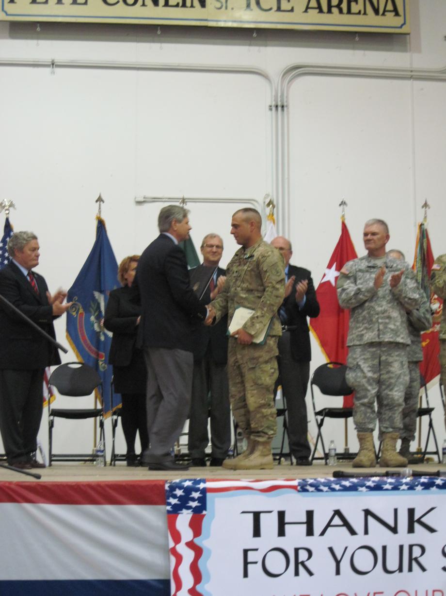 818th Engineering Company Freedom Salute-May, 2013- Senator Hoeven joins the community to welcome home members of the North Dakota National Guard's 818th Engineering Company (Sapper) and to pay tribute to Sgt. 1st Class Darren Linde and Spc. Tyler Orgaard who were killed in action and Spc. Ian Placek who was wounded in the same attack. 