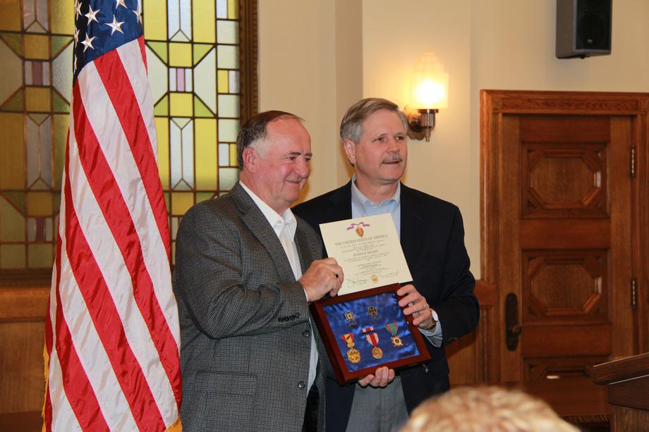 Purple Heart Presentation-May, 2013- Senator Hoeven presents Vietnam veteran James Tofteland with the Purple Heart and other military medals he earned serving in the Army. 