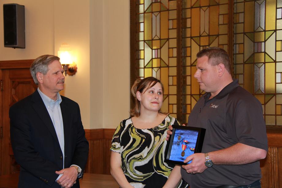 Military Awards Presentation-May, 2013- Senator Hoeven presents Minot resident and veteran Jospeh Swital with his military awards. Senator Hoeven's office helped to reissue the medals to Swital after his original awards were lost in the 2011 flood. 