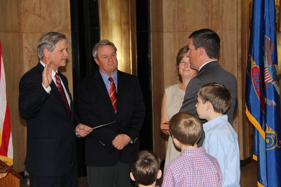 Tony Clark Swearing In Ceremony-June 2012- Senator John Hoeven thanks North Dakota Public Service Commissioner Tony Clark for his service to the state before administering the oath of office for Clark to serve on the Federal Energy Regulatory Commission (FERC). Clark was sworn in for a four-year term as a commissioner at FERC, an independent agency responsible for regulating the interstate transmission of electricity and natural gas.