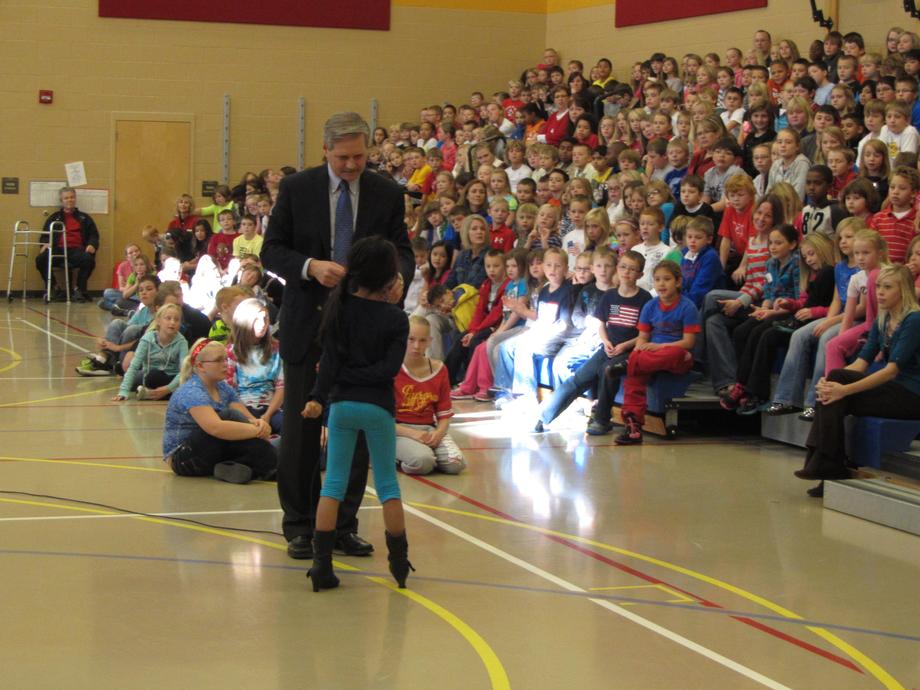 Aurora Elementary Operation Caring Classroom Assembly-November, 2012- Senator Hoeven meets with West Fargo-based Aurora Elementary School students during an assembly held to discuss the meaning of Veterans Day and the importance of honoring America’s military families, and especially the children of military service members. The ceremony is part of a nationwide effort led by the Armed Forces Foundation to designate the week prior to Veterans Day as Operation Caring Classroom as a way to teach students from across the country more about our nation’s veterans, armed forces and military families. Aurora Elementary is representing the State of North Dakota in this program.