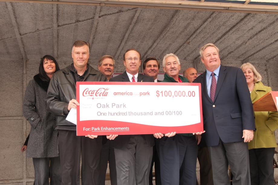 Oak Park Award Presentation-October, 2011- Senator Hoeven joins the Minot community as Coca-Cola officals present Oak Park with a $100,000 grant and officially name the park 