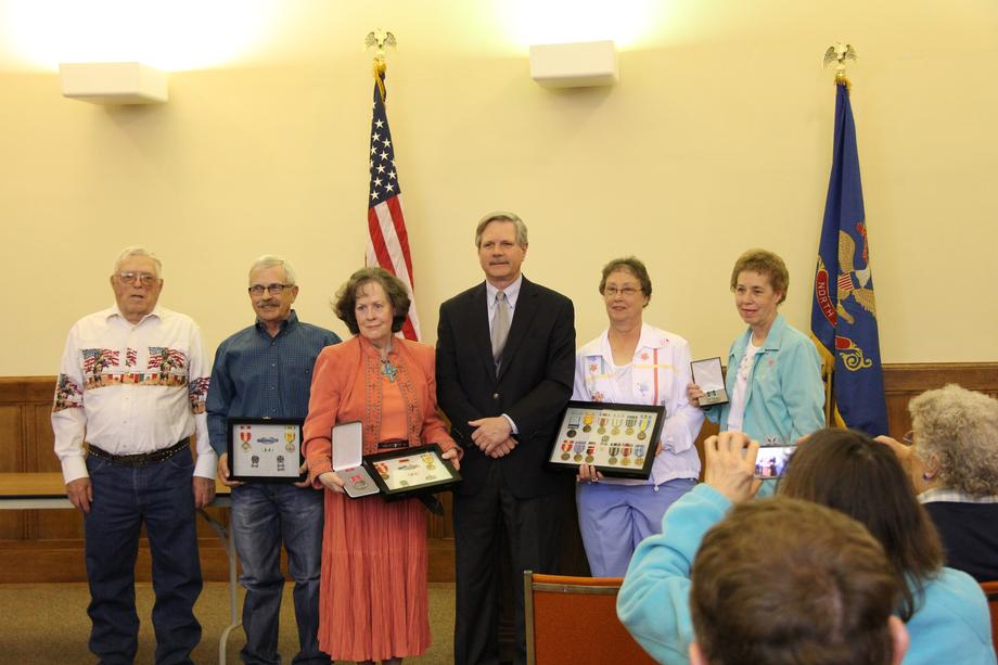 Minot Veterans Medal Presentation-April 2014- At a ceremony in Minot, Senator Hoeven honors the military service of four North Dakota veterans, presenting military awards to Ernest Hoelscher of Berthold, Roger Sundsbak of Velva and to the families of Minot veterans William Garrison and Clarence “Kelly” Eliason.