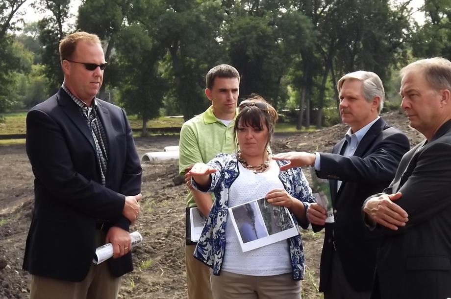 Mickelson Field Levee and Lift Project-August 2014- Senator Hoeven joins Fargo officials in a tour of the Mickelson Field flood protection project, which consists of a 1,500-foot earthen levee and a sewer lift station with a 20,000 gallons-per-minute pumping capacity. 