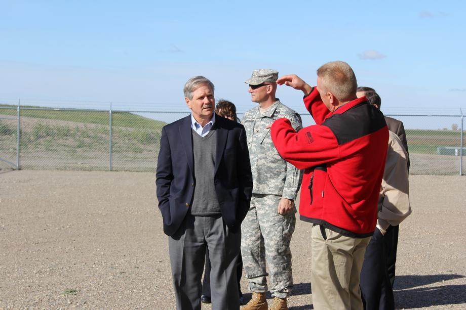 Devils Lake Embankment Inspection-October 2014 - Senator Hoeven, who has worked for more than a decade to help stabilize Devils Lake with an outlet and mitigation measures, and as a senator has helped to secure more than $500 million to protect the city and region from flooding, leads a tour of the nearly completed embankment project.