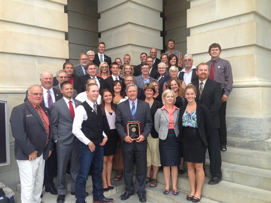 North Dakota Farmers Union-September 2014 - Senator Hoeven is presented the Golden Triangle Award by members of the North Dakota Farmers Union. 