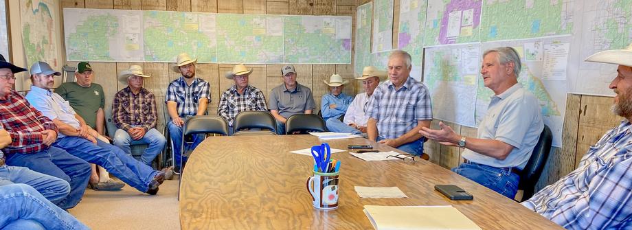 August 2022 - Senator Hoeven discusses grazing efforts with members of the McKenzie County Grazing Association.