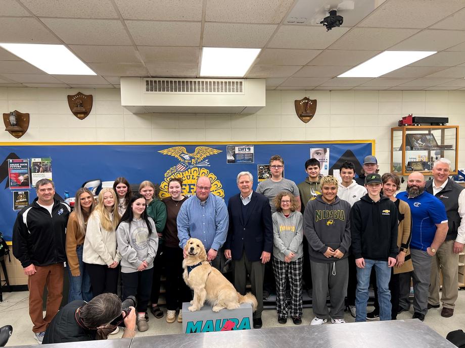 January 2023 – Senator Hoeven meets Maura, the therapy dog being trained at Hillsboro High School as part of the pilot program for increasing student access to behavioral health support.