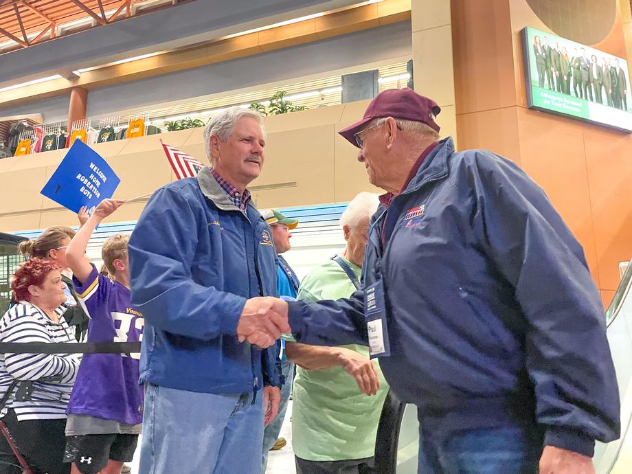 October 2022 - Senator Hoeven welcomes nearly 100 veterans back home after a 3-day trip to D.C. organized by Veterans Honor Flight of ND/MN.