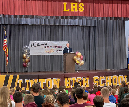 October 2022 – Senator Hoeven presents a U.S. flag flown over the U.S. Capitol to the students, educators and families of Linton Public School in honor of their designation as a 2022 National Blue Ribbon School.