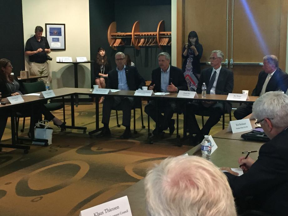 General Atomics-July 2015 - Hoeven hosts officials from high-tech leader General Atomics in Grand Forks  to make the case for siting a new unmanned aerial systems (UAS) training center in the area