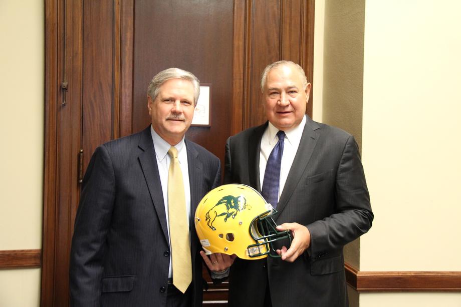 Visit with Chuck Wald-October 2015 - Senator Hoeven and Chuck Wald, a former Four-Star General and North Dakota State University football player