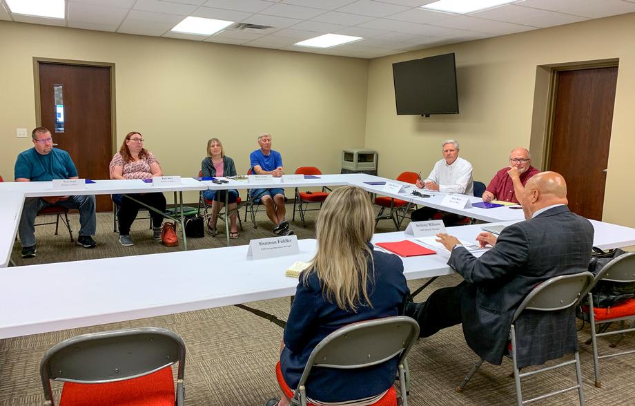 June 2022 - Senator Hoeven discusses delayed postal delivery in Minot with USPS leadership and residents.